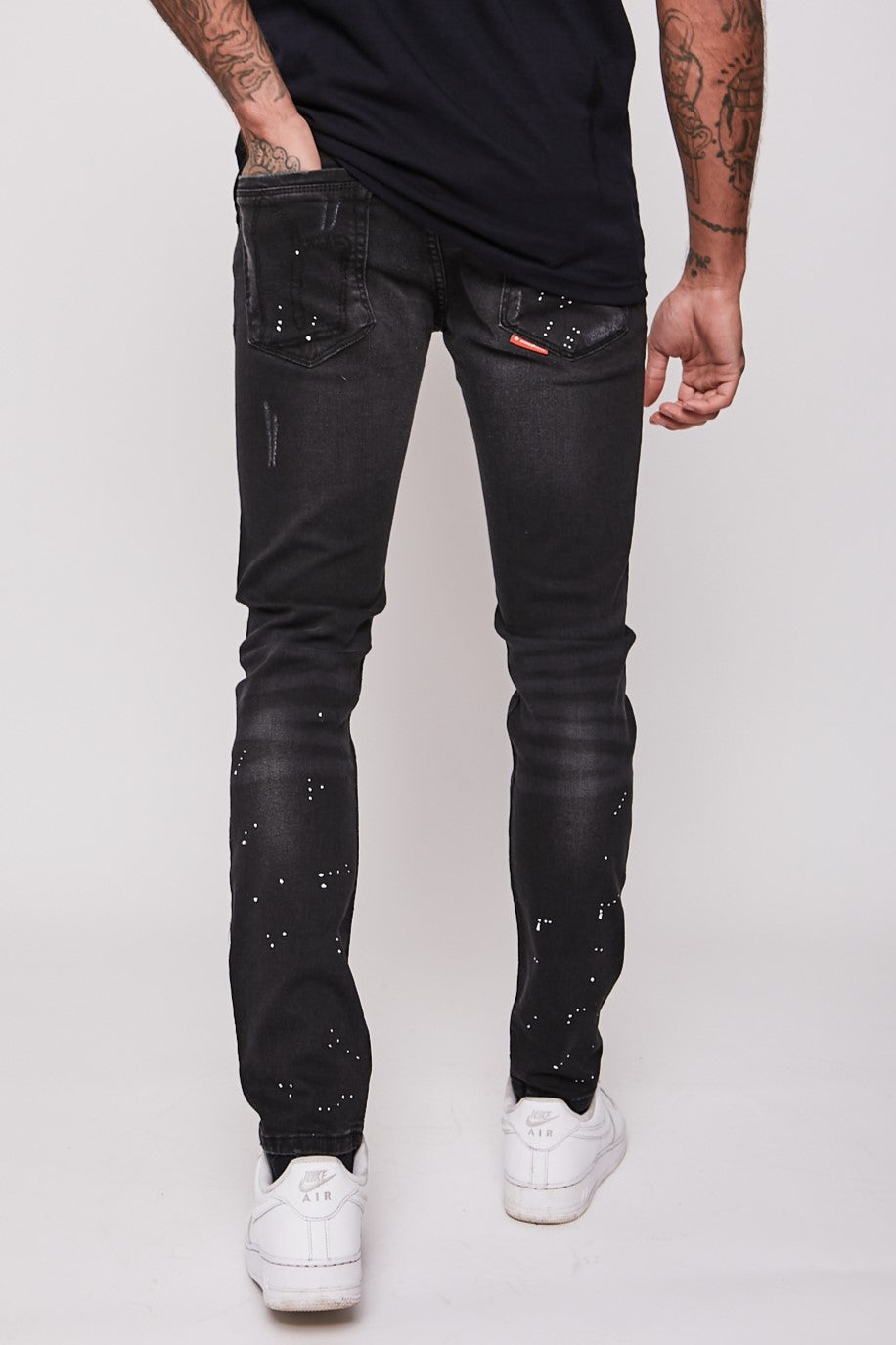 Men's paint splatter sales ripped jeans