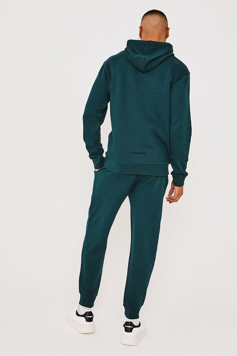 Dark green tracksuit mens sale